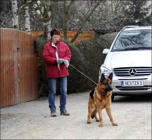 Sigrid Reinhard with VA1 Zamp vom Thermodos at the entrance to their kennel in Bad Neustadt Germany