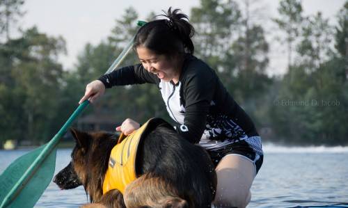 Coni on paddle board with Aslan candid unedit